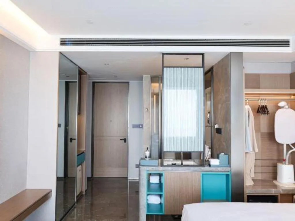 Bed in Chutian Guangdong International Hotel