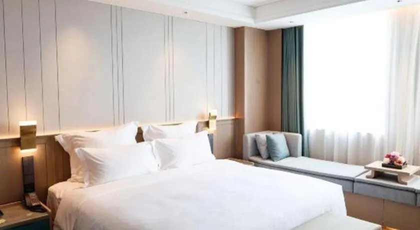 Bed in Chutian Guangdong International Hotel