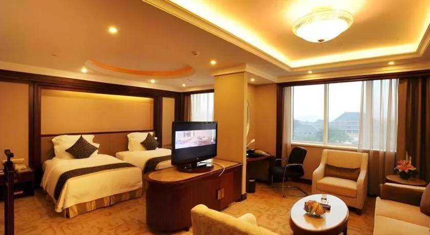 Bed in Chutian Guangdong International Hotel