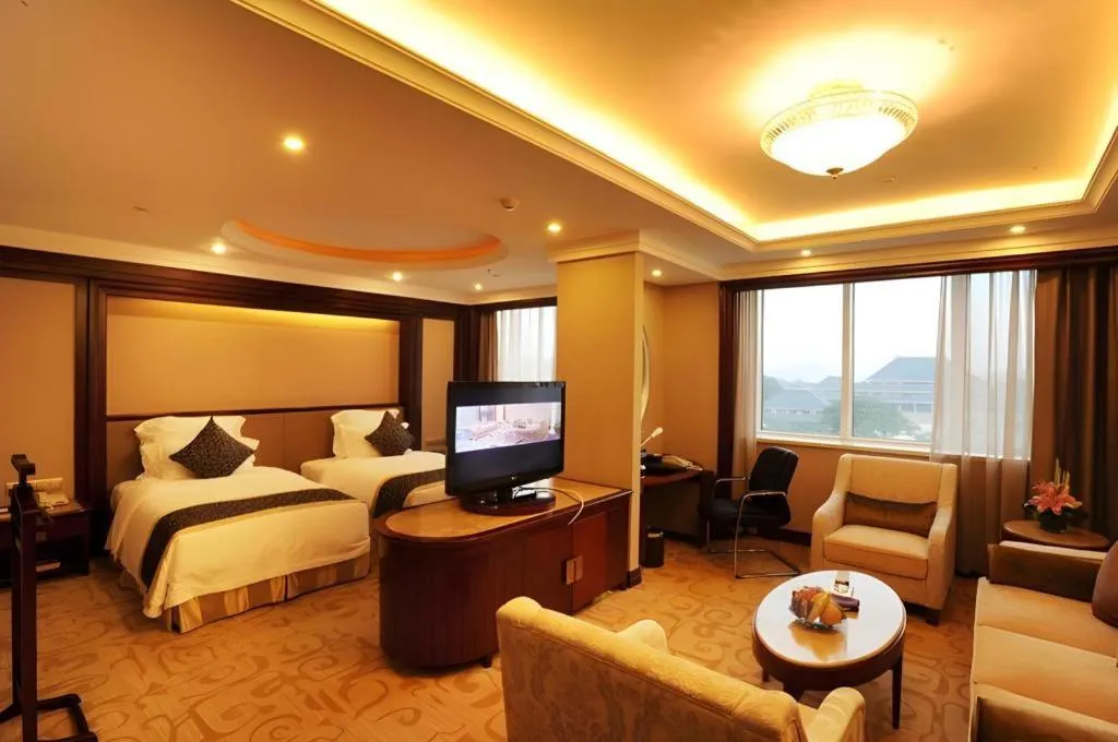 Bed in Chutian Guangdong International Hotel