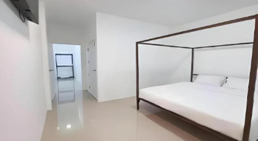 Bed in WICKET WHITE VILLA