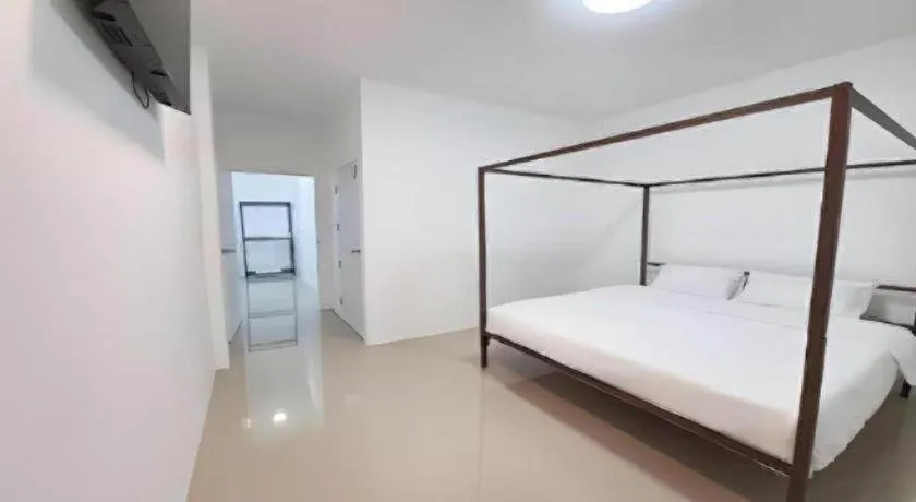 Bed in WICKET WHITE VILLA