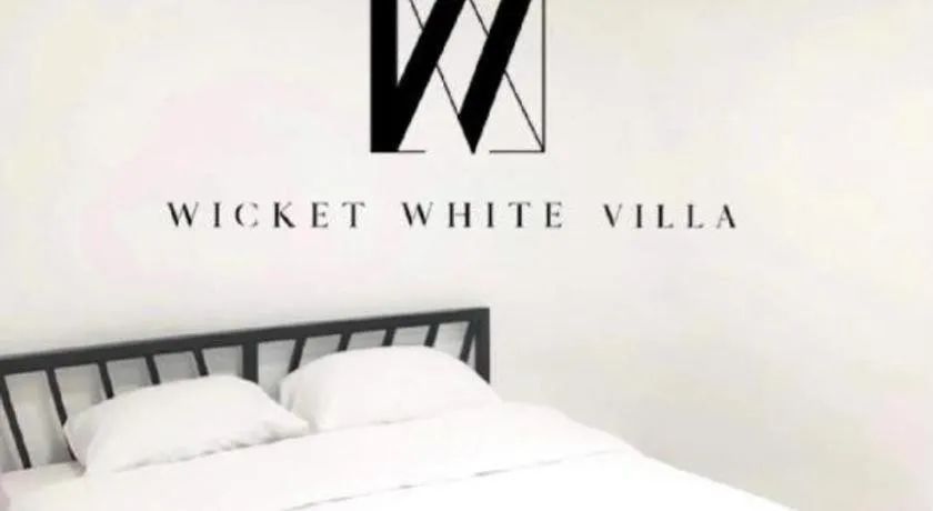 Bed in WICKET WHITE VILLA