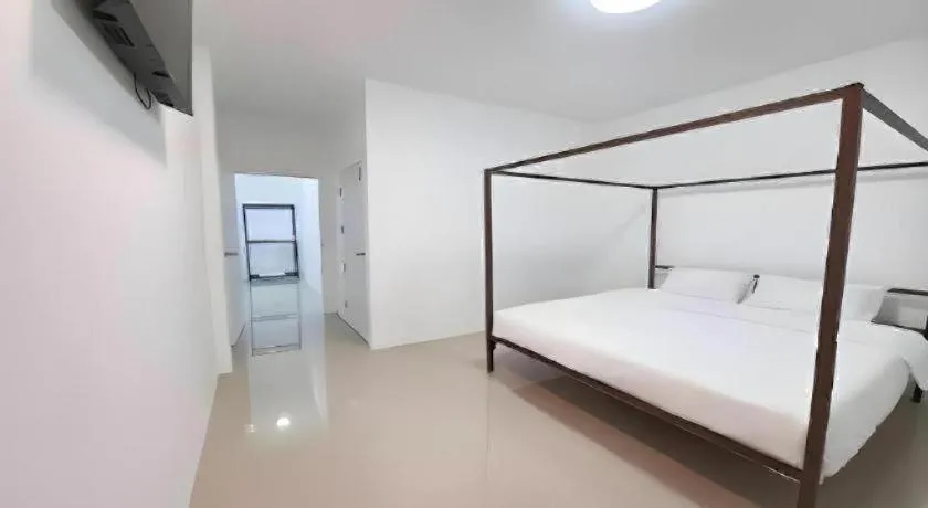 Bed in WICKET WHITE VILLA