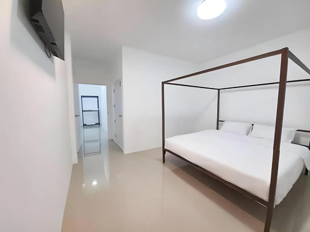 Bed in WICKET WHITE VILLA