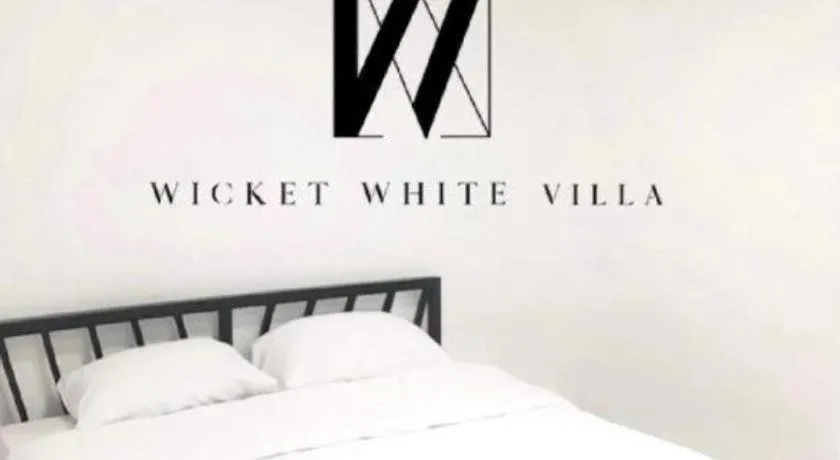 Bed in WICKET WHITE VILLA