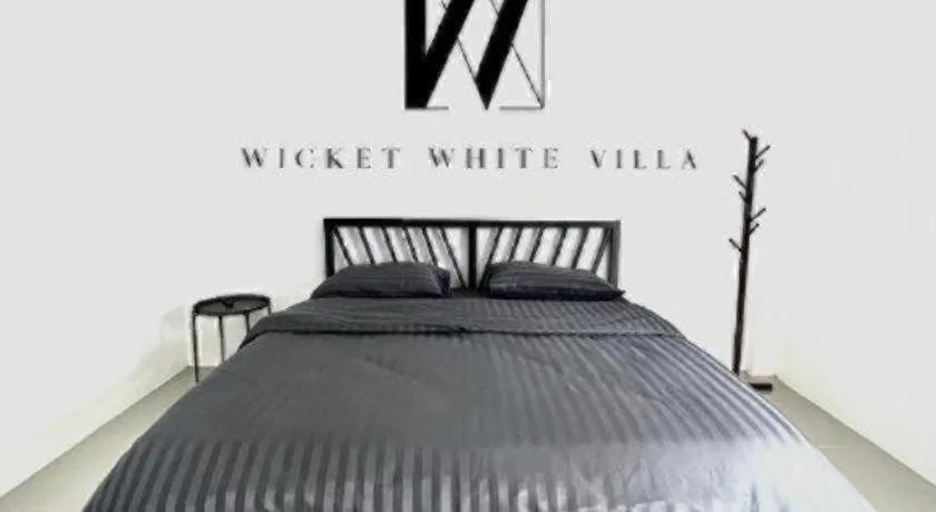 Bed in WICKET WHITE VILLA