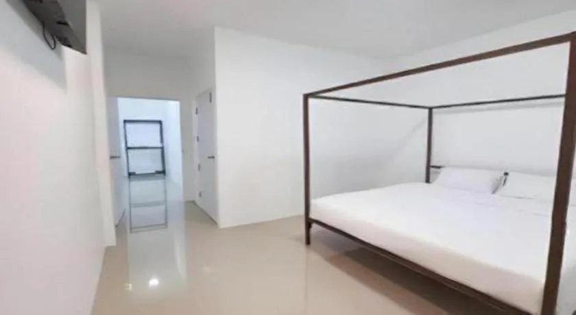 Bed in WICKET WHITE VILLA