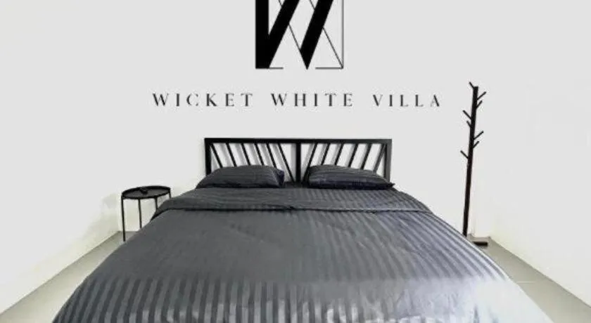 Bed in WICKET WHITE VILLA