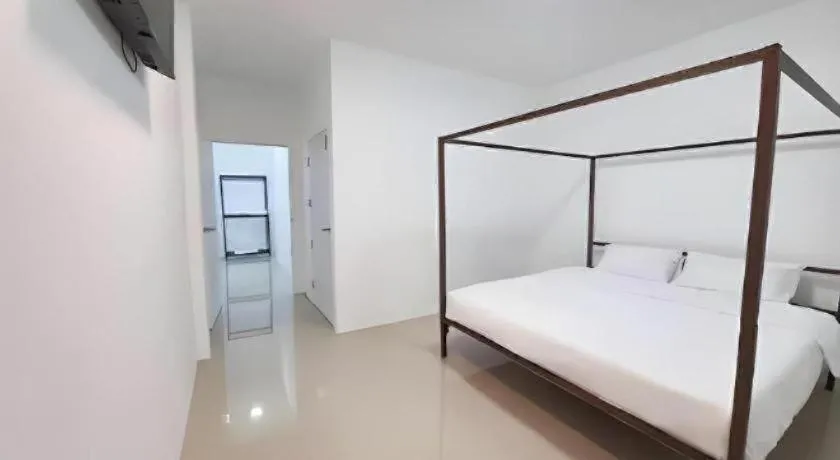 Bed in WICKET WHITE VILLA