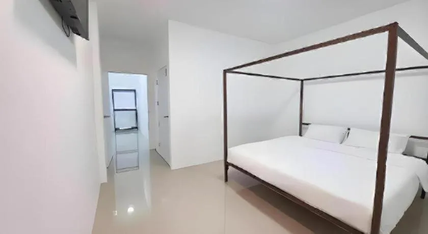 Bed in WICKET WHITE VILLA