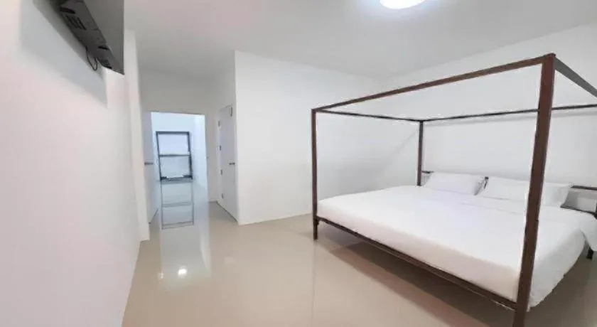 Bed in WICKET WHITE VILLA