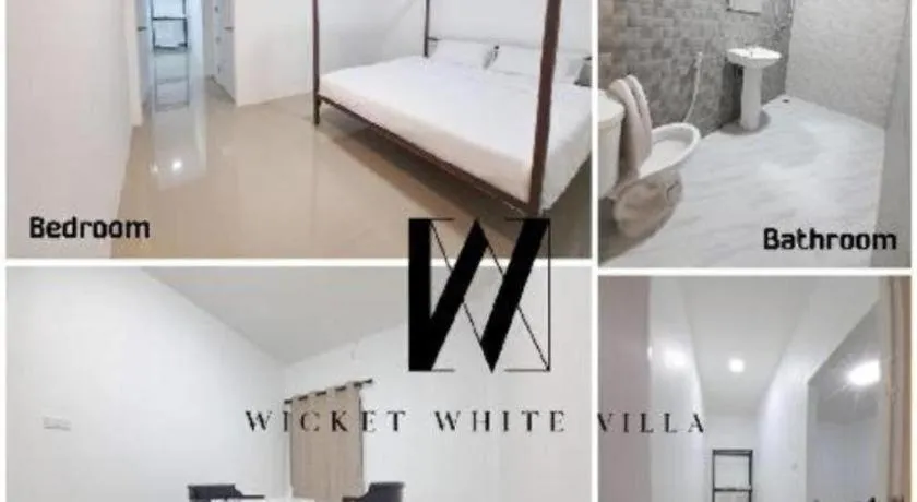Bed in WICKET WHITE VILLA