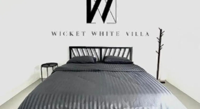 Bed in WICKET WHITE VILLA