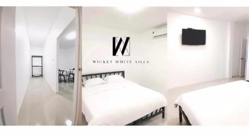 Bed in WICKET WHITE VILLA