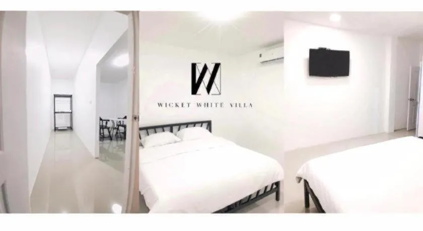 Bed in WICKET WHITE VILLA