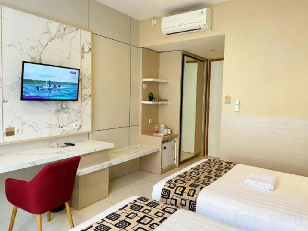 Bed in Sumbawa Grand Hotel