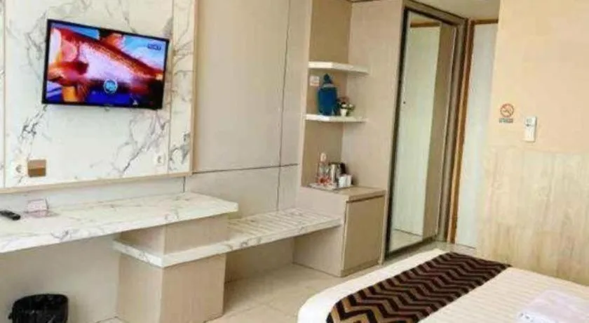 Bed in Sumbawa Grand Hotel