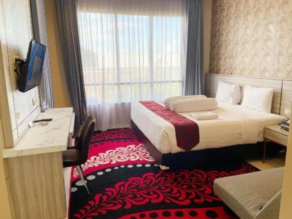 Bed in Sumbawa Grand Hotel