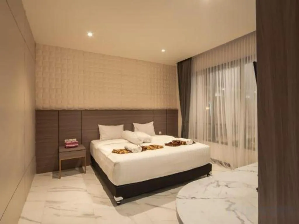 Bed in Sumbawa Grand Hotel