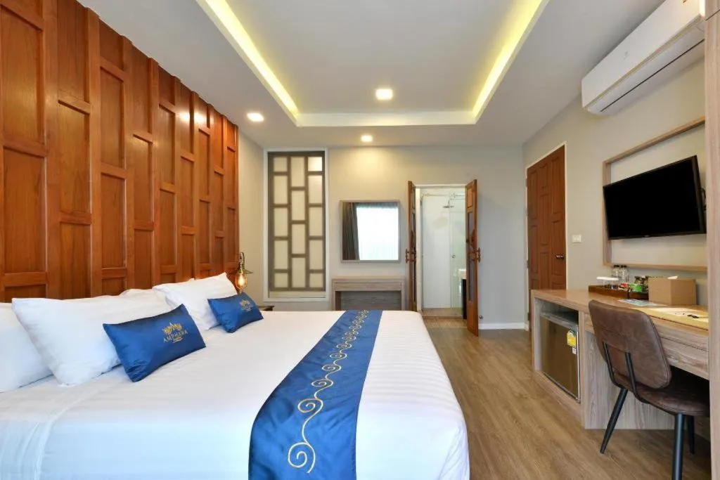 Bed in Amphawa Riverfront Hotel