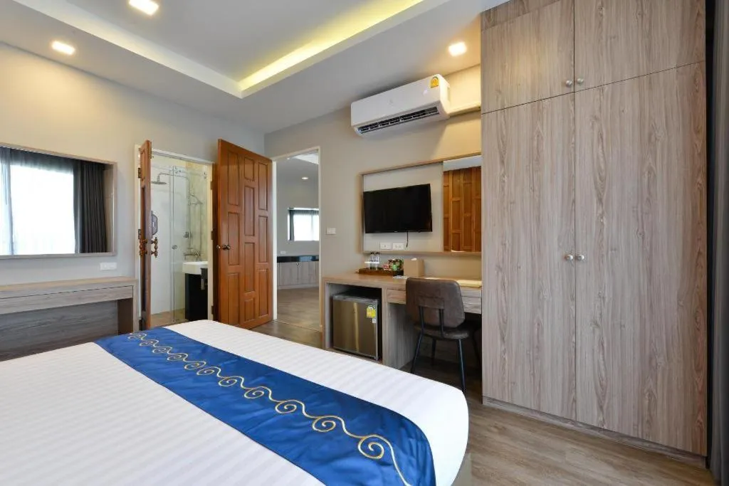 Bed in Amphawa Riverfront Hotel