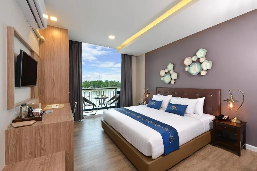 Bed in Amphawa Riverfront Hotel