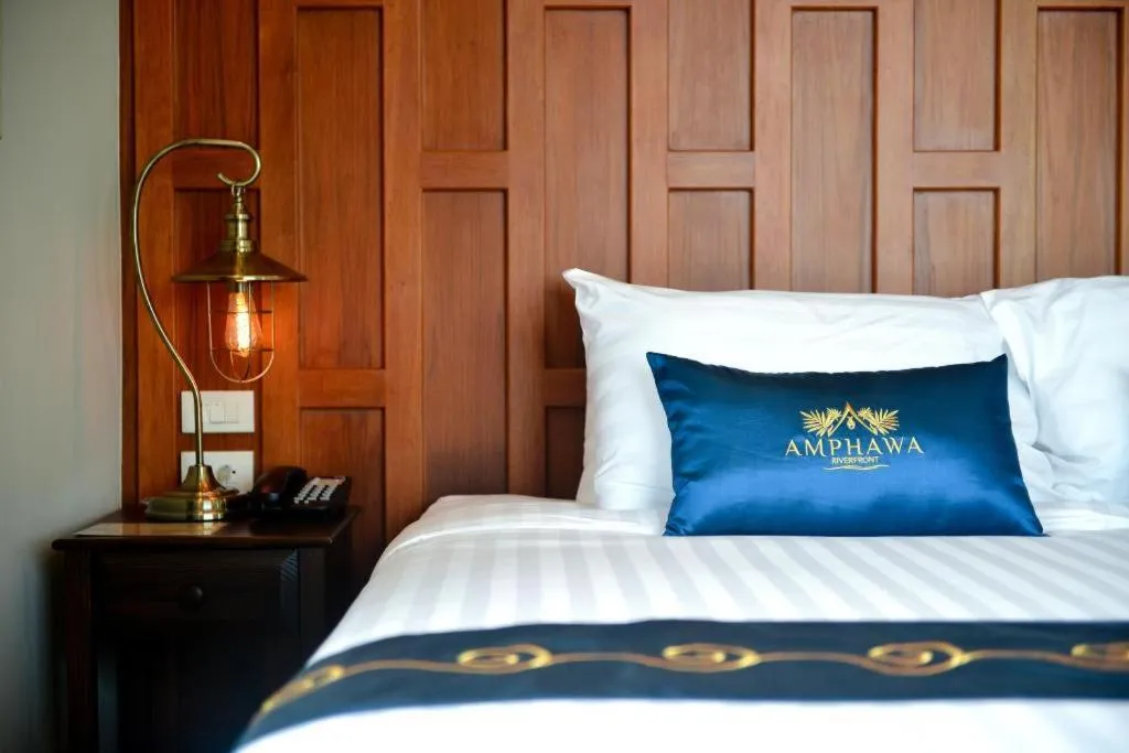 Bed in Amphawa Riverfront Hotel