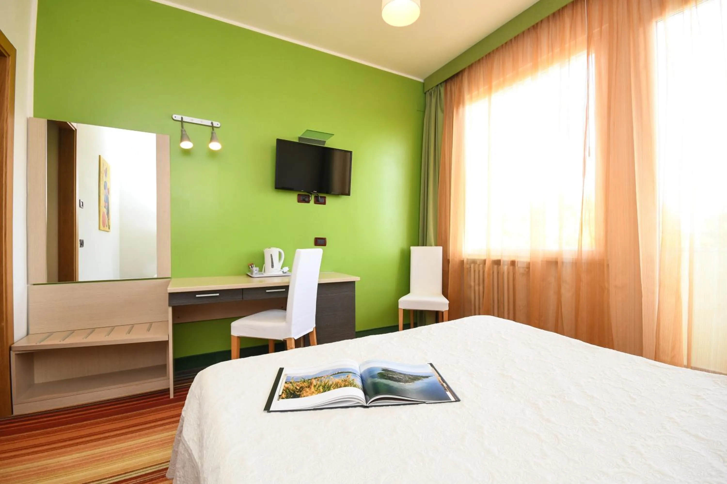 Bedroom in Hotel Suisse