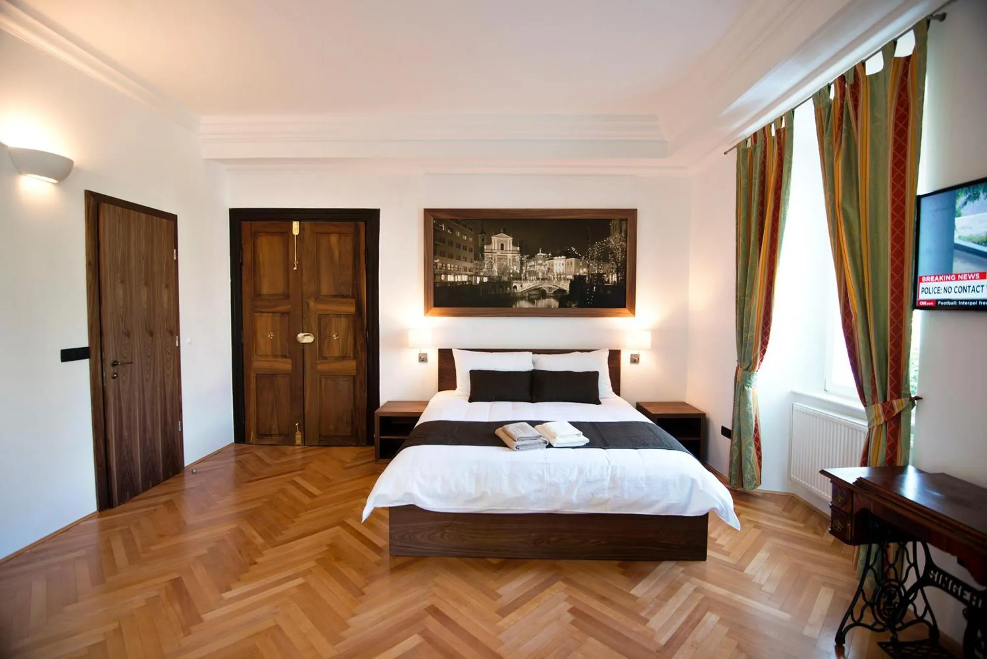 Bed in Zois Apartments