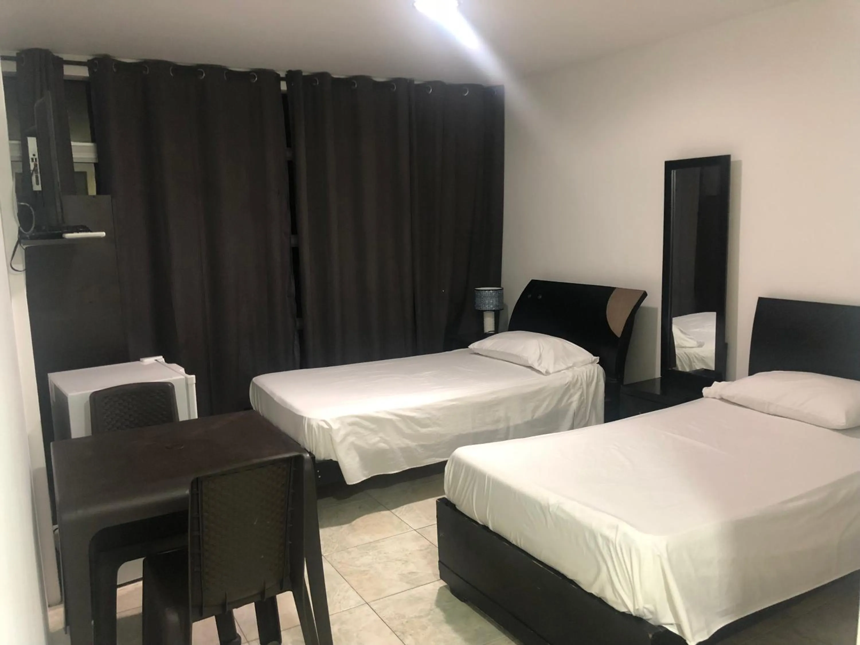 Photo of the whole room, Bed in Hostal Central Beach