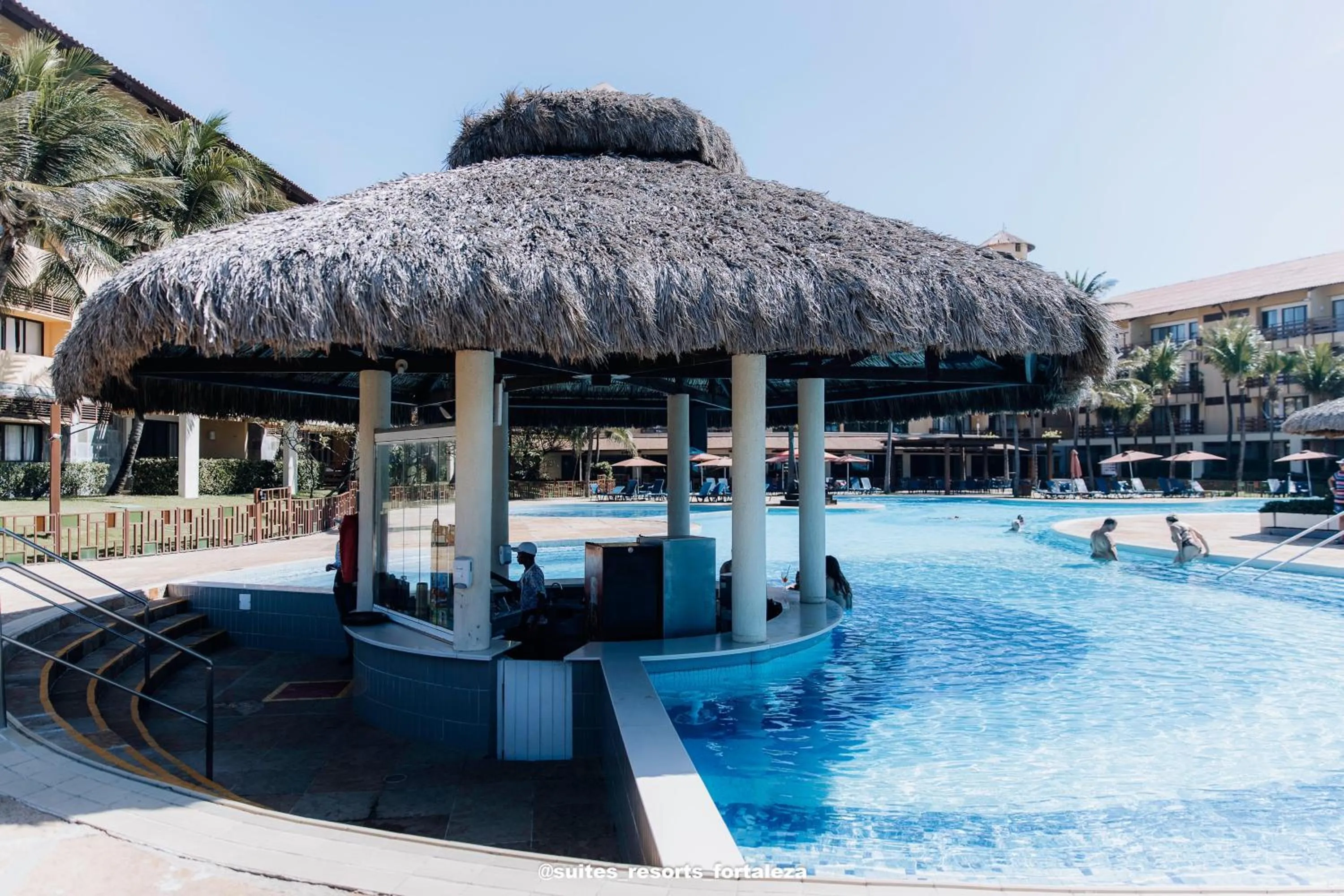 Swimming pool in Apartamento - Pé na areia - Ao lado do parque aquático - Administrado por Anfitrião