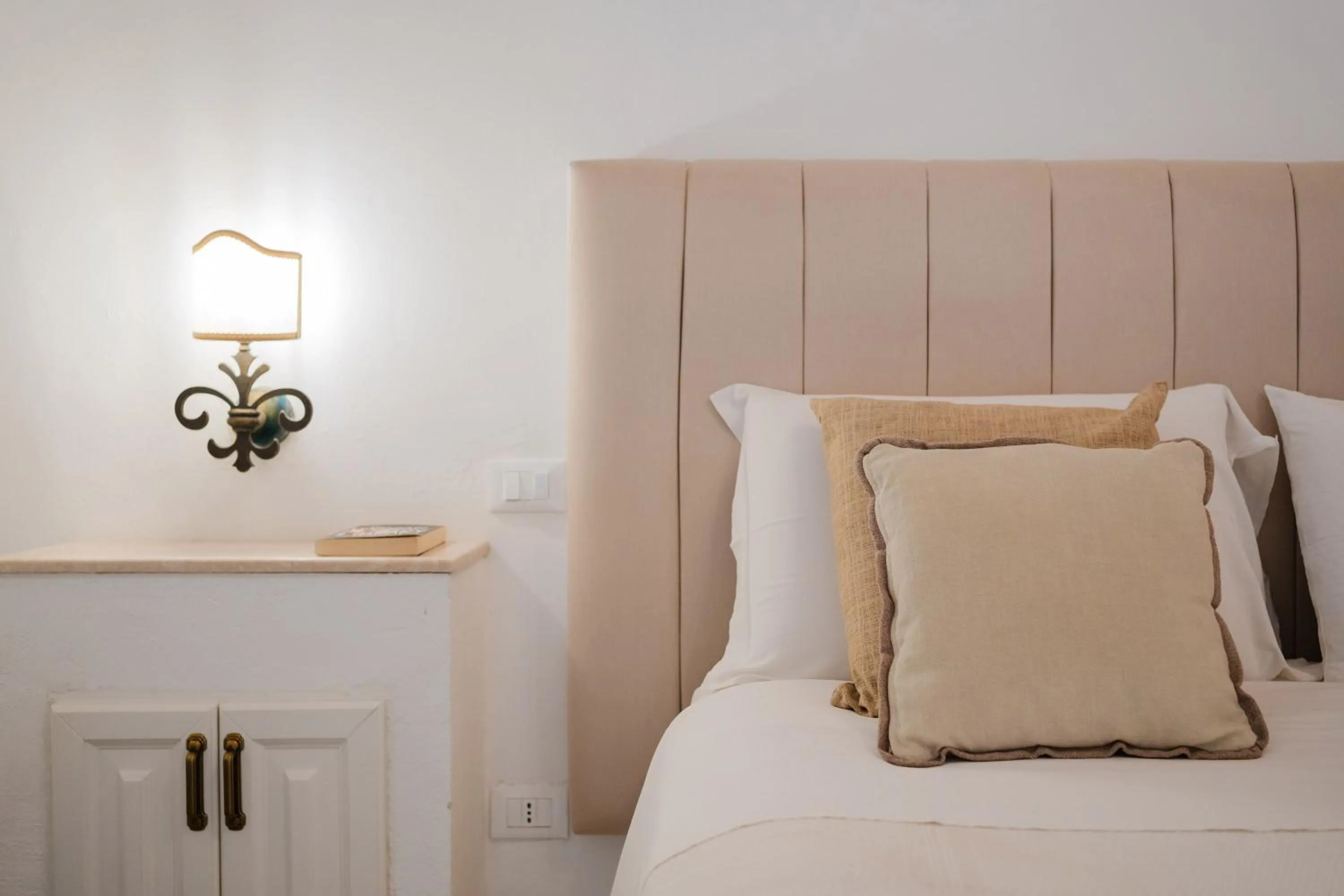 Bed in Relais La Casa del Poeta