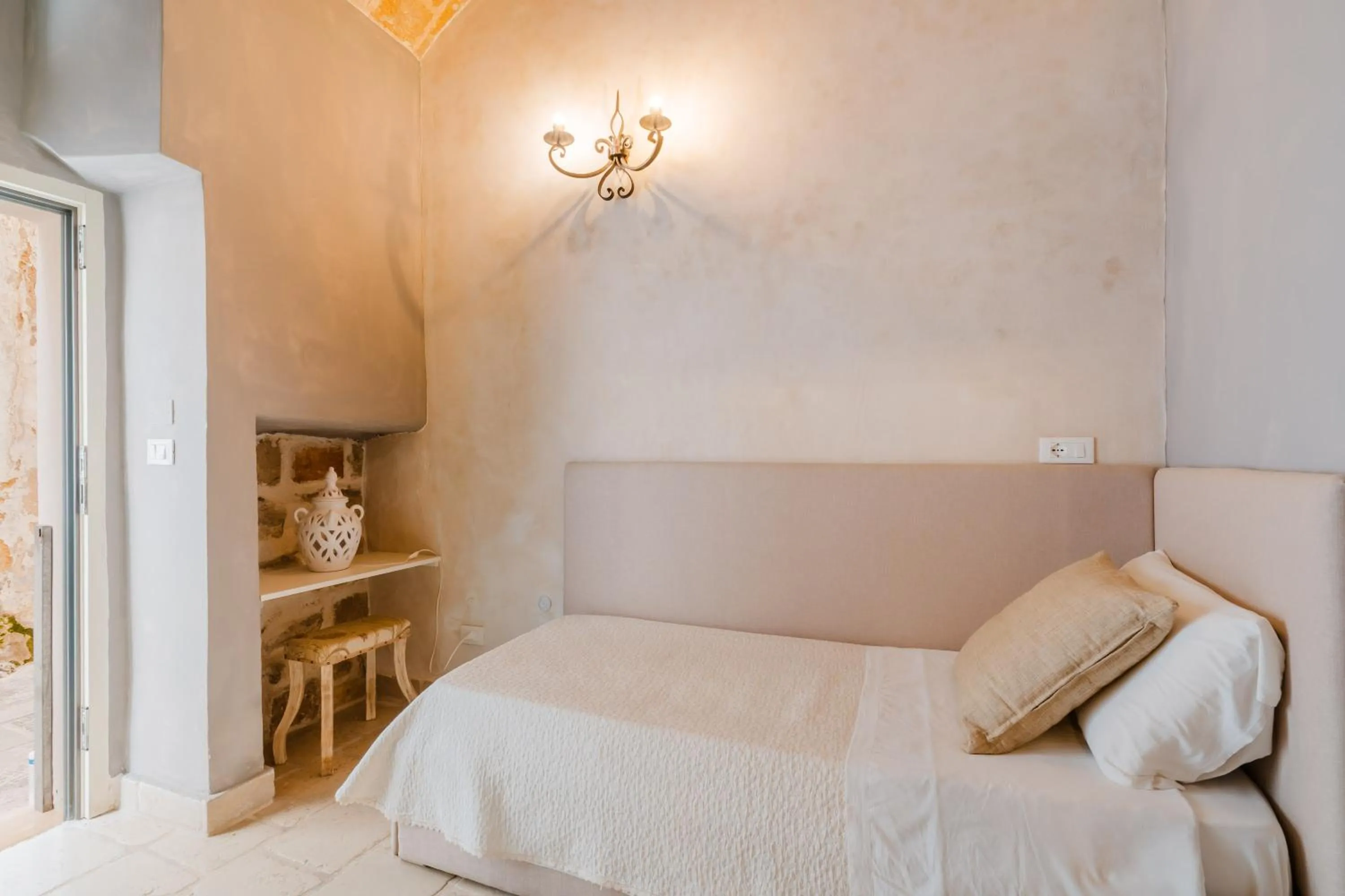 Bed in Relais La Casa del Poeta