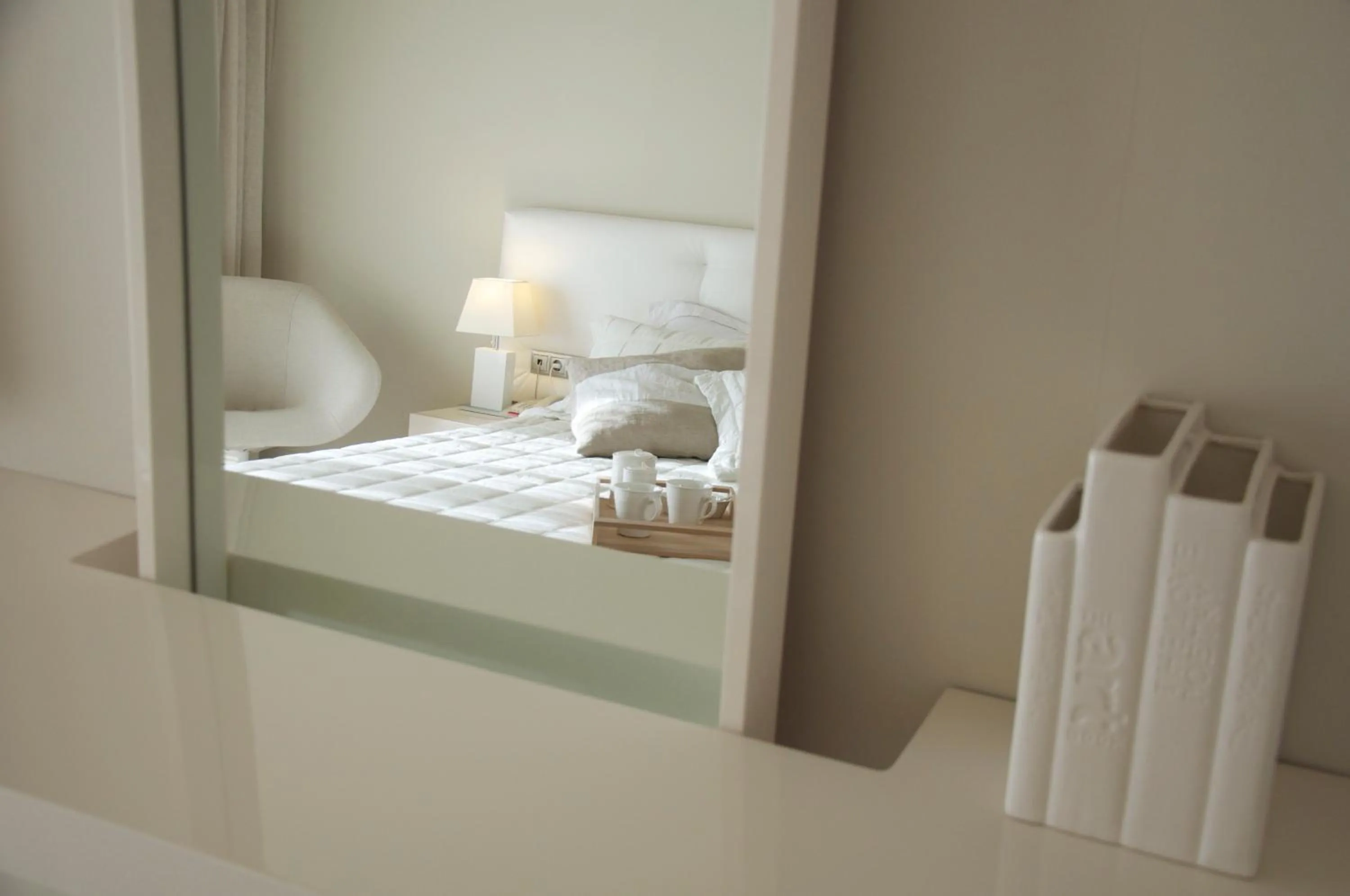 Decorative detail, Bed in Ino Hotel & Suites