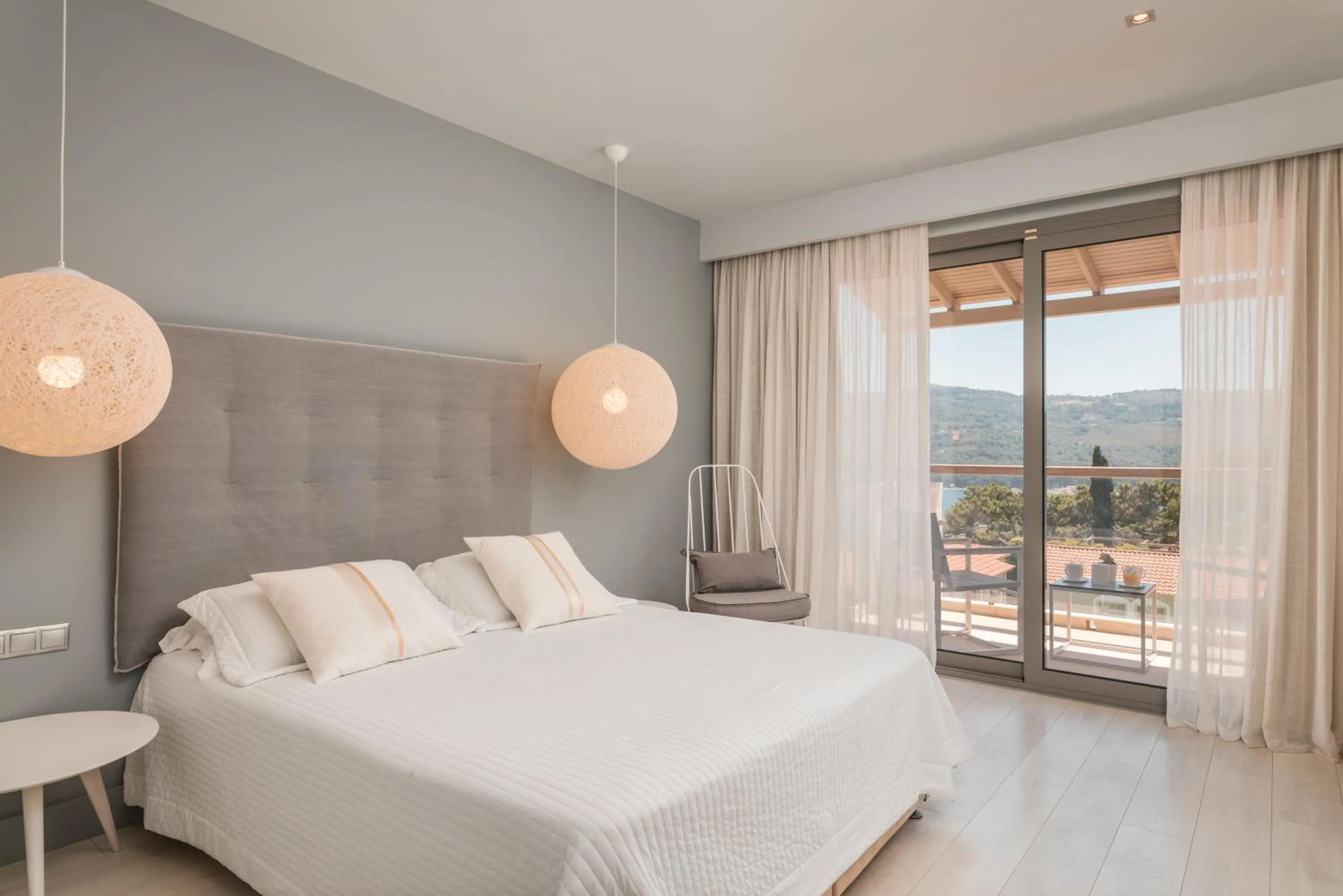 Bed in Ino Hotel & Suites