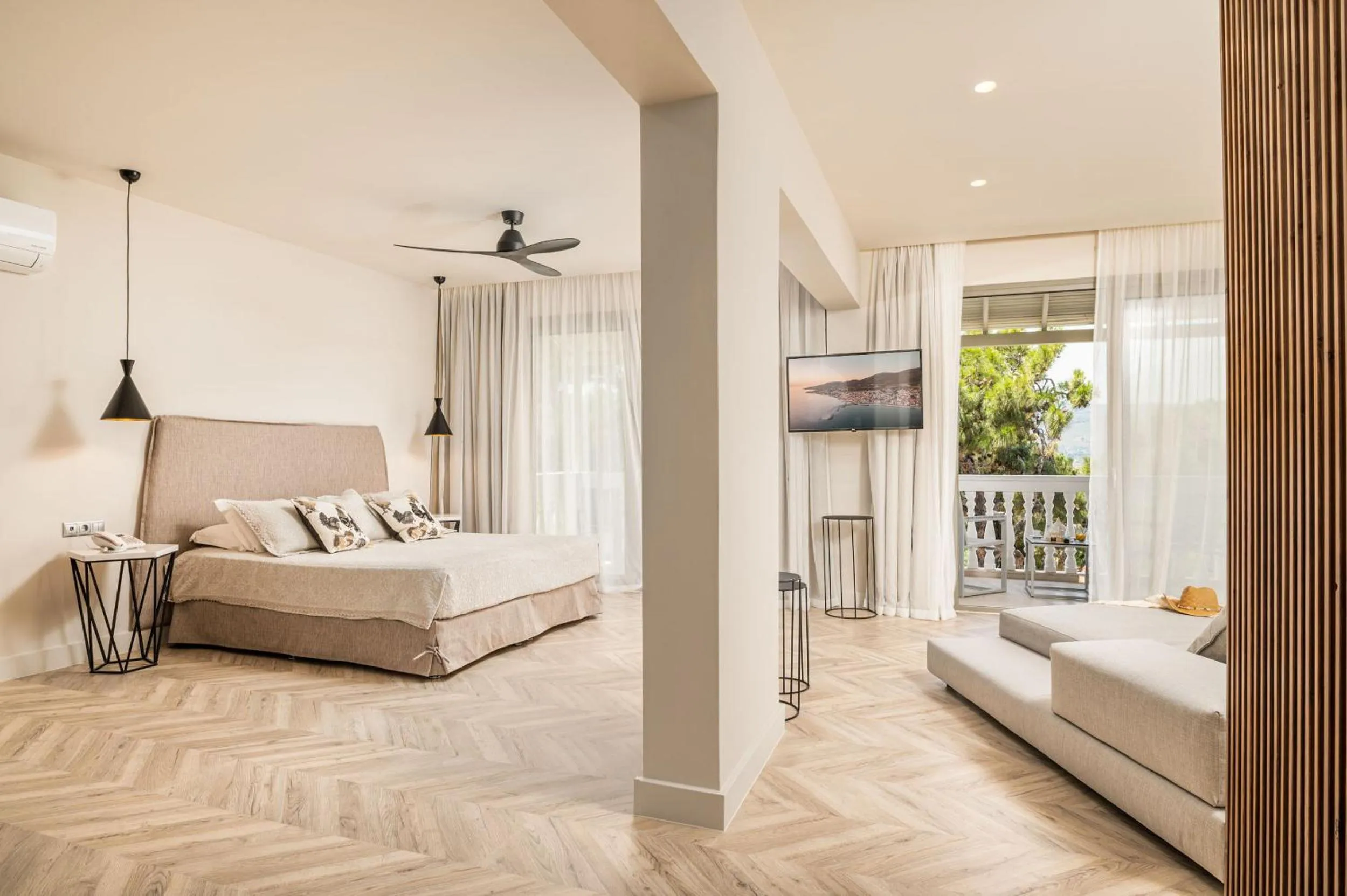 Bed in Ino Hotel & Suites