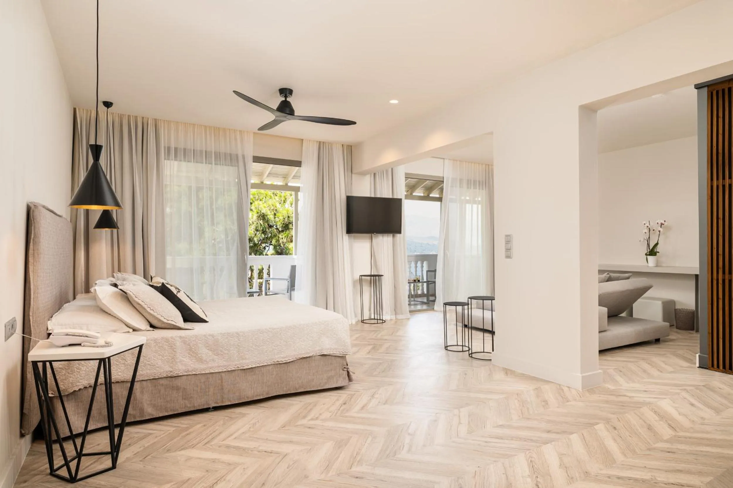 Bed in Ino Hotel & Suites