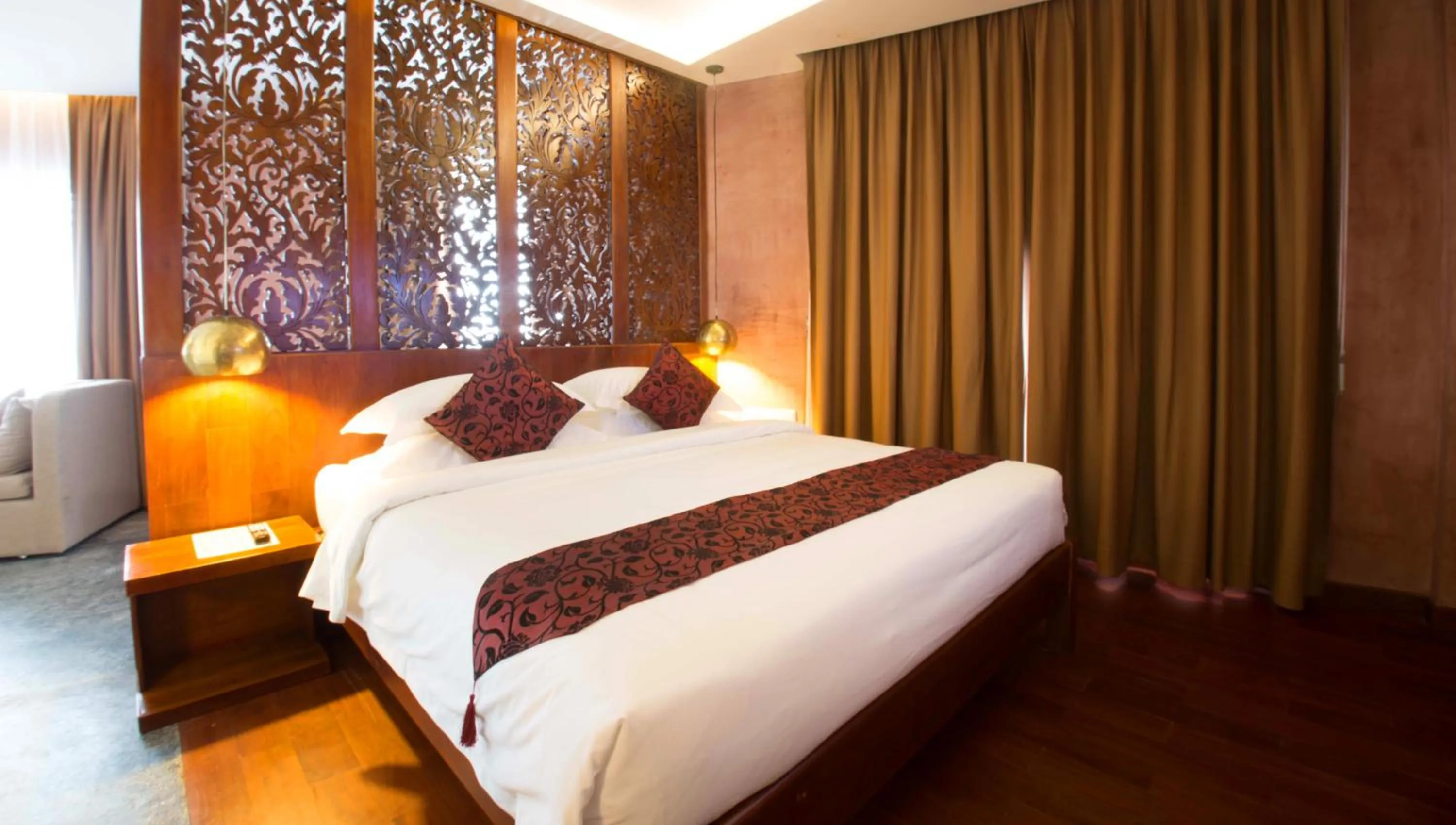 Seating area, Bed in Almond Hotel Bassac River