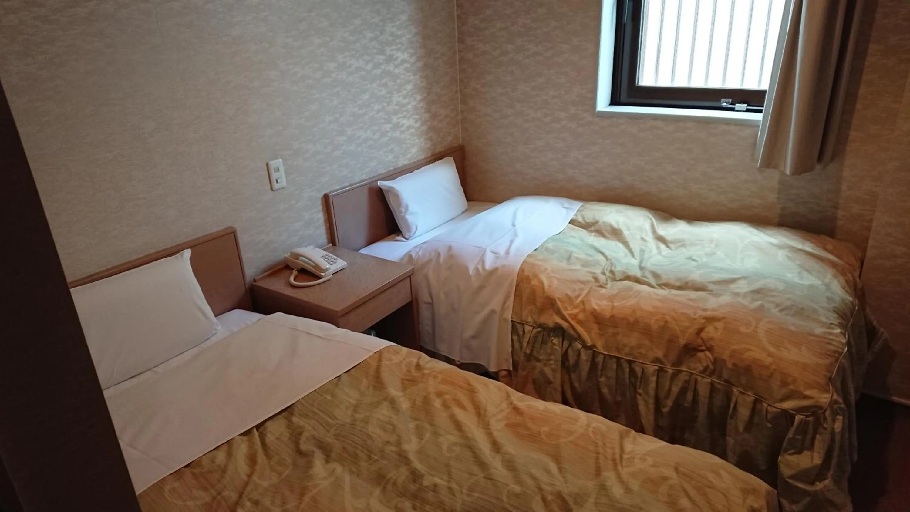Bed in Hotel Muroran Hills