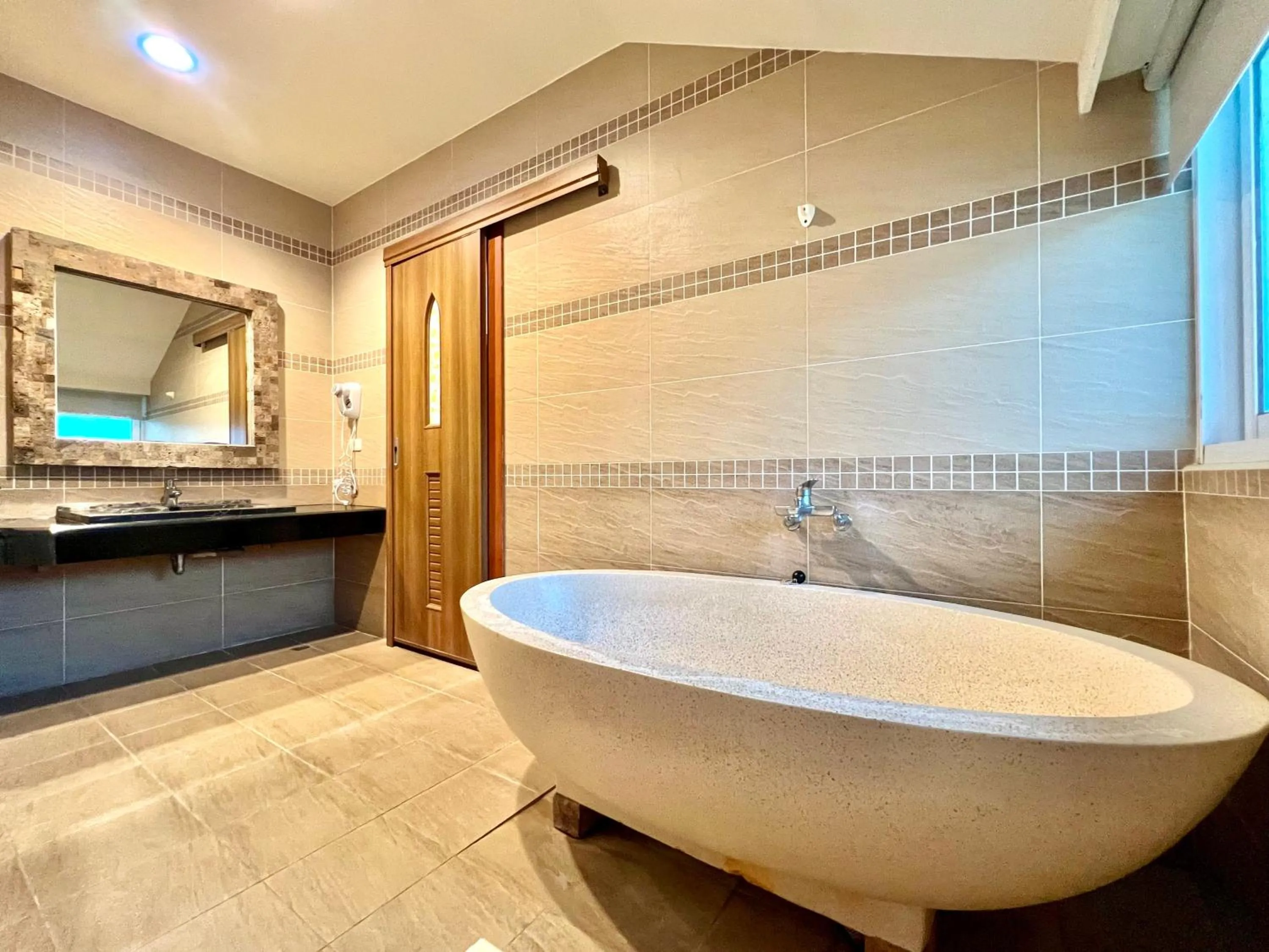 Bathroom in Seasons Bali Fashion Inn