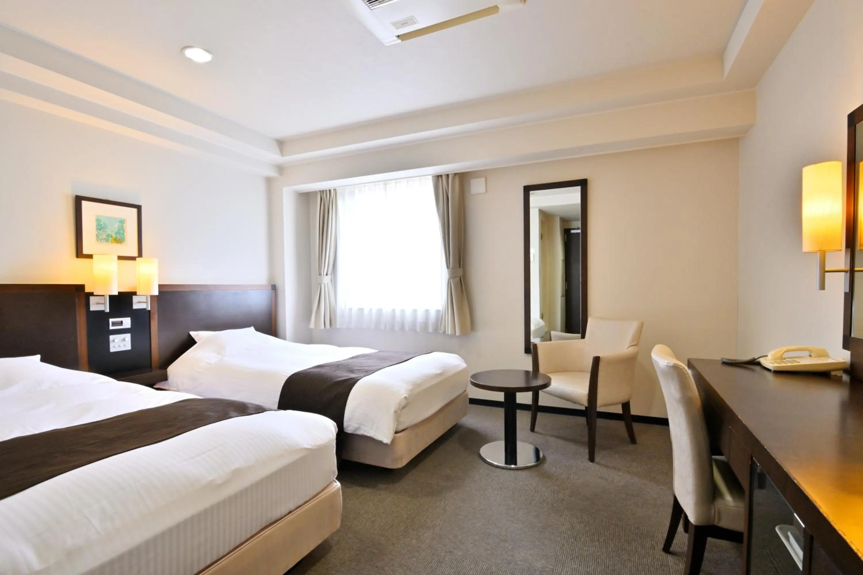 Bed in Saijo Urban Hotel