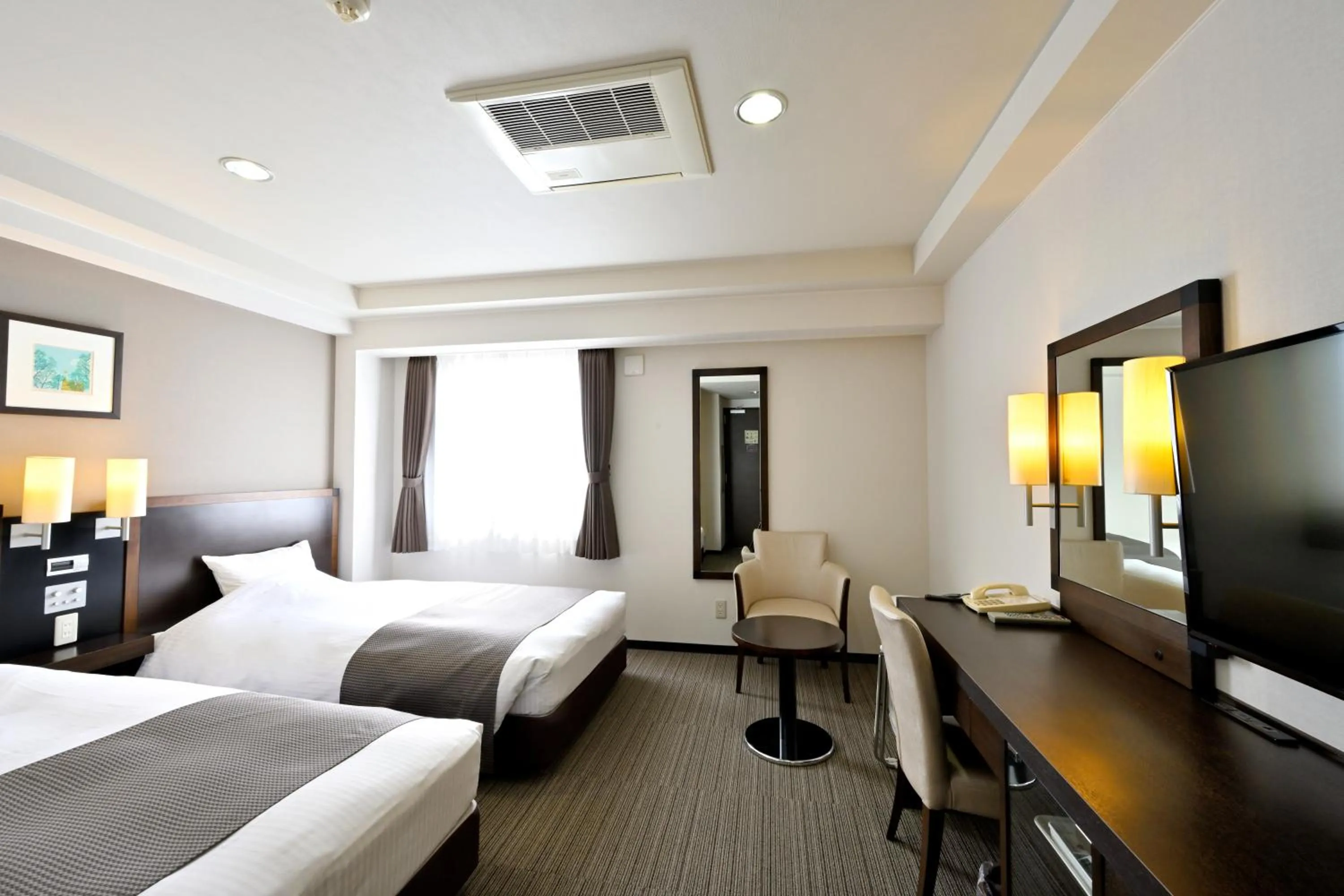 Bed in Saijo Urban Hotel