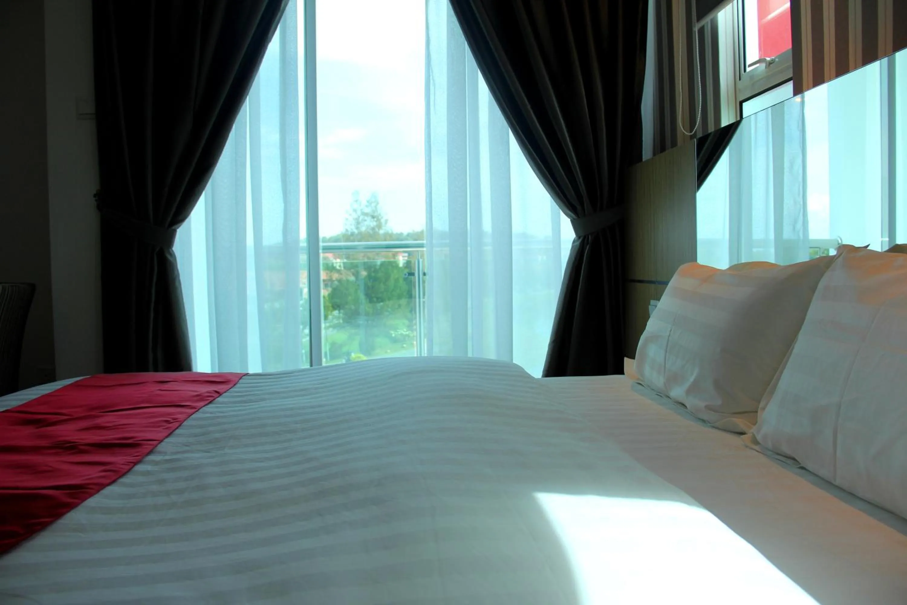 Bed in 906 Premier Hotel