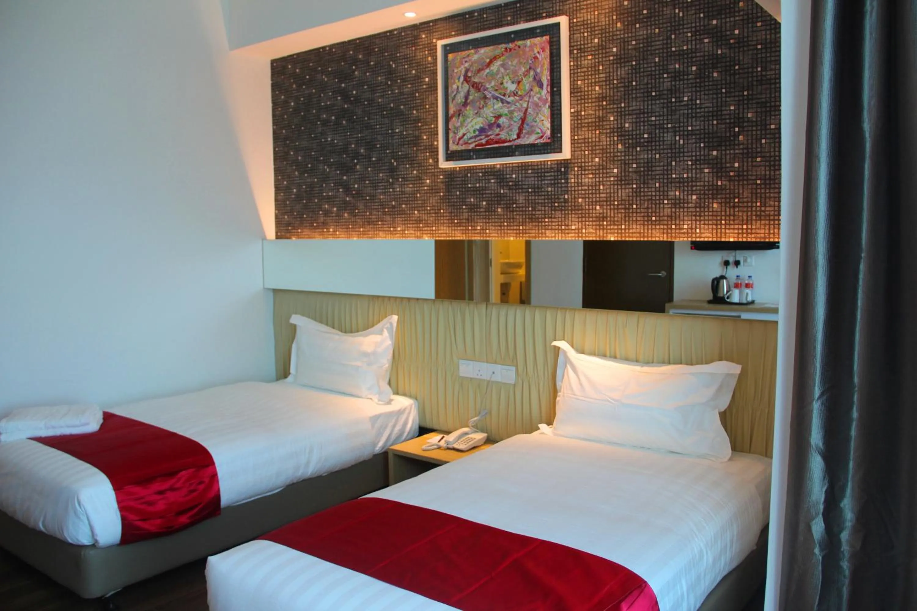 Bed in 906 Premier Hotel