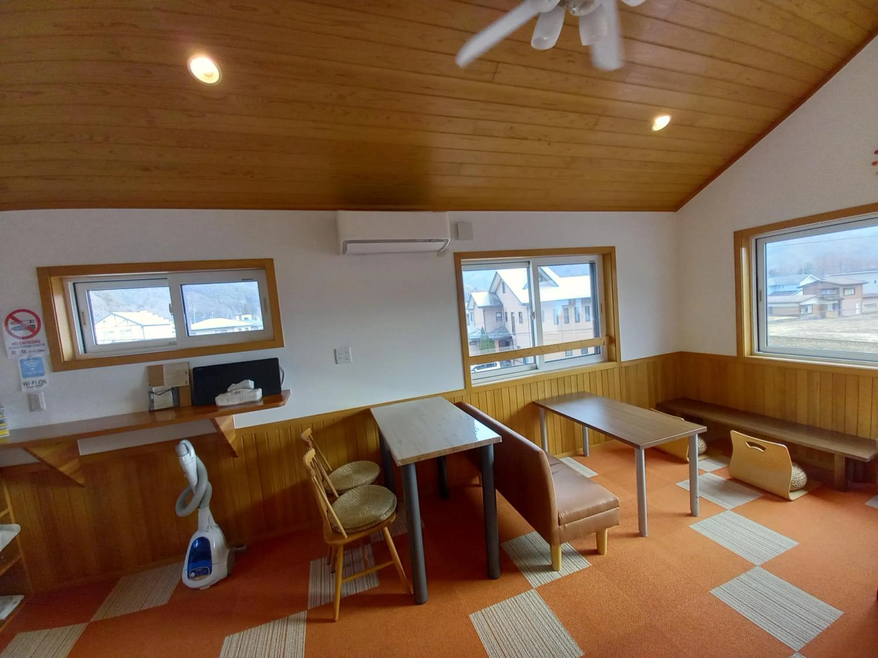 Living room in Orange Cabin Inn far from station