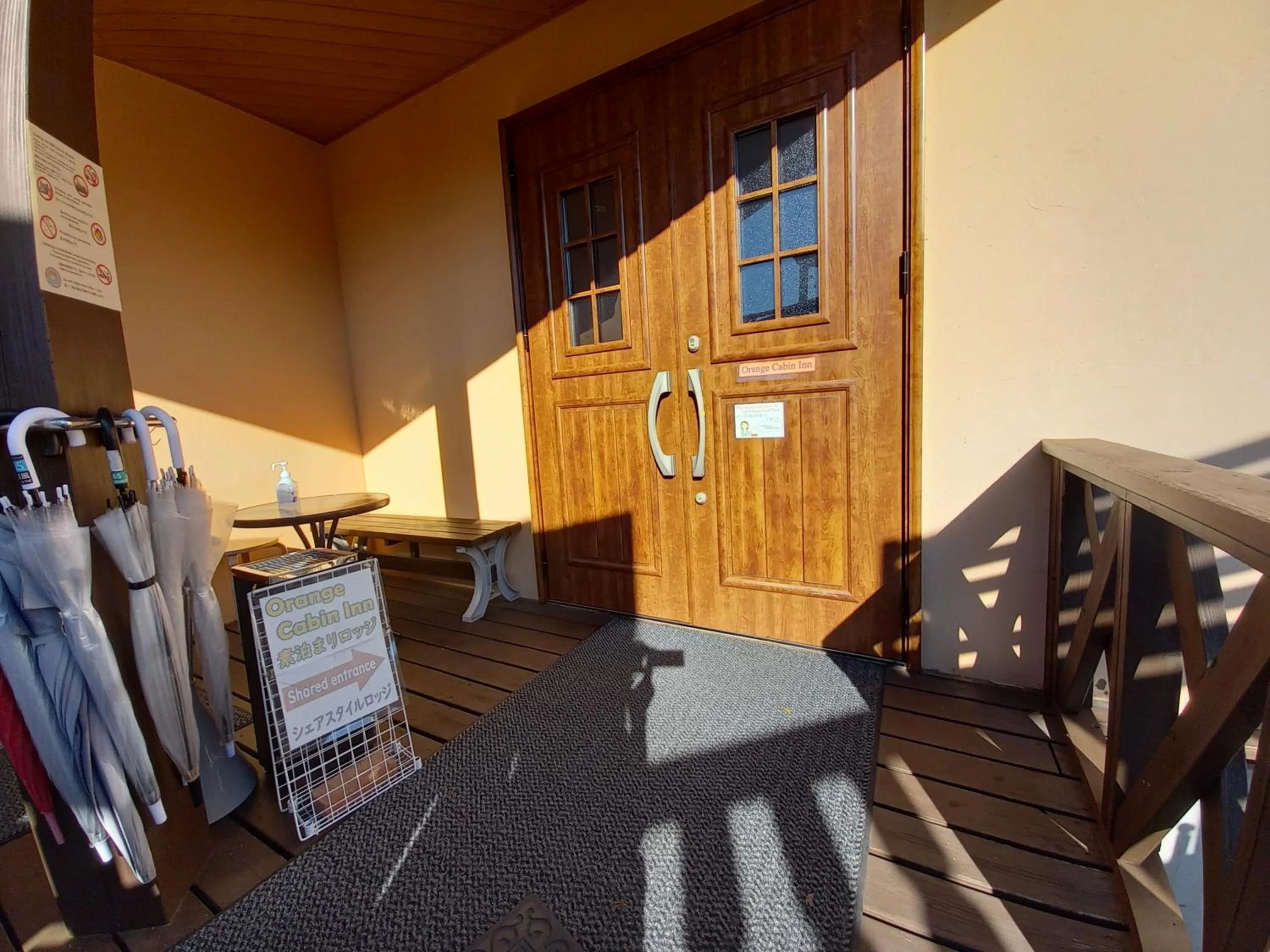 Facade/entrance in Orange Cabin Inn far from station