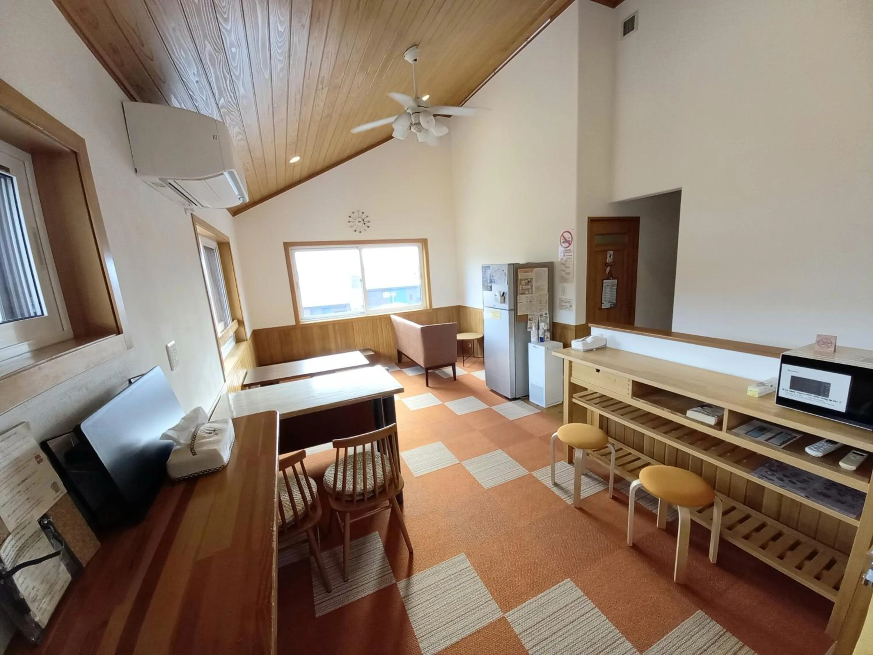 Living room in Orange Cabin Inn far from station