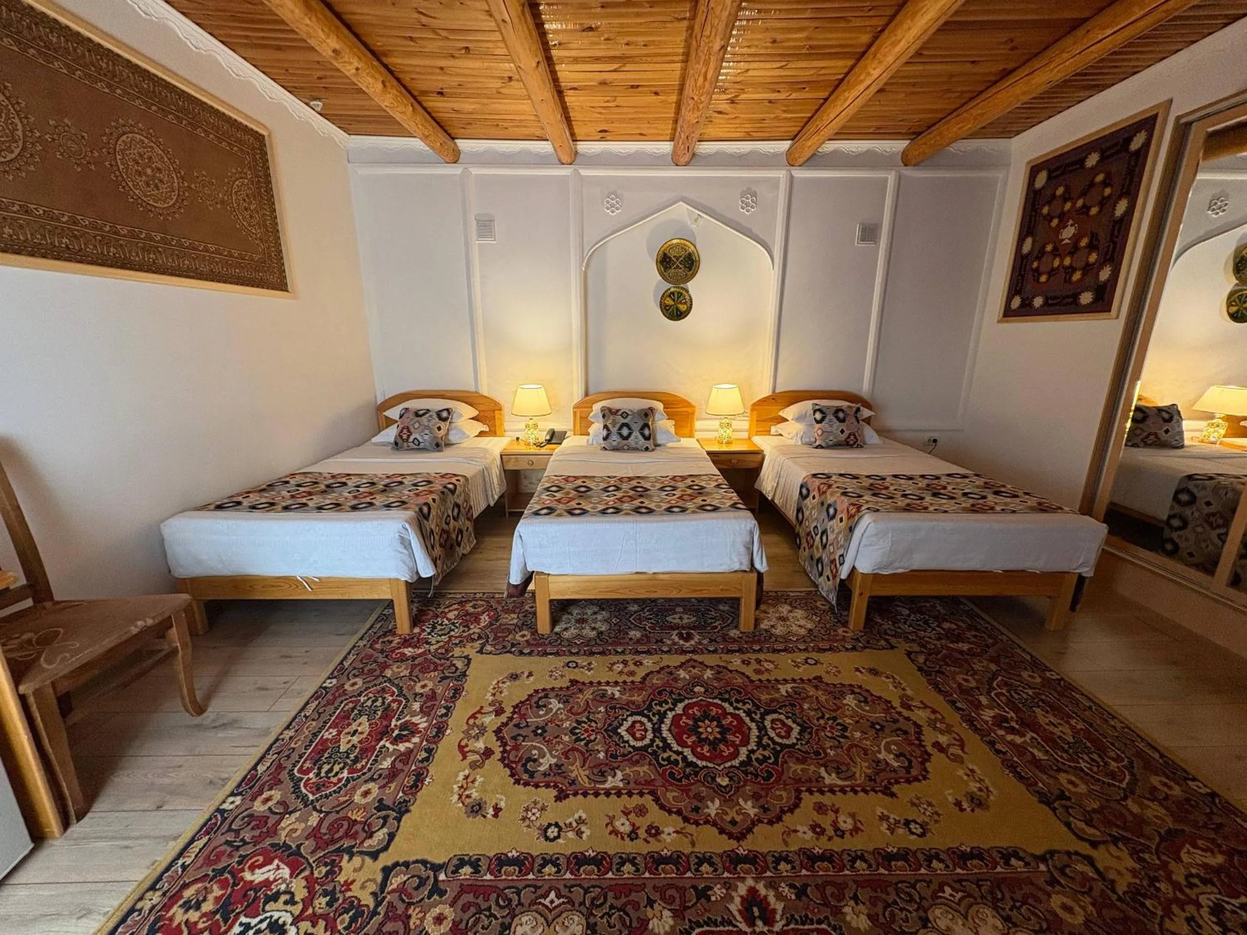 Bed in Porso Boutique Hotel