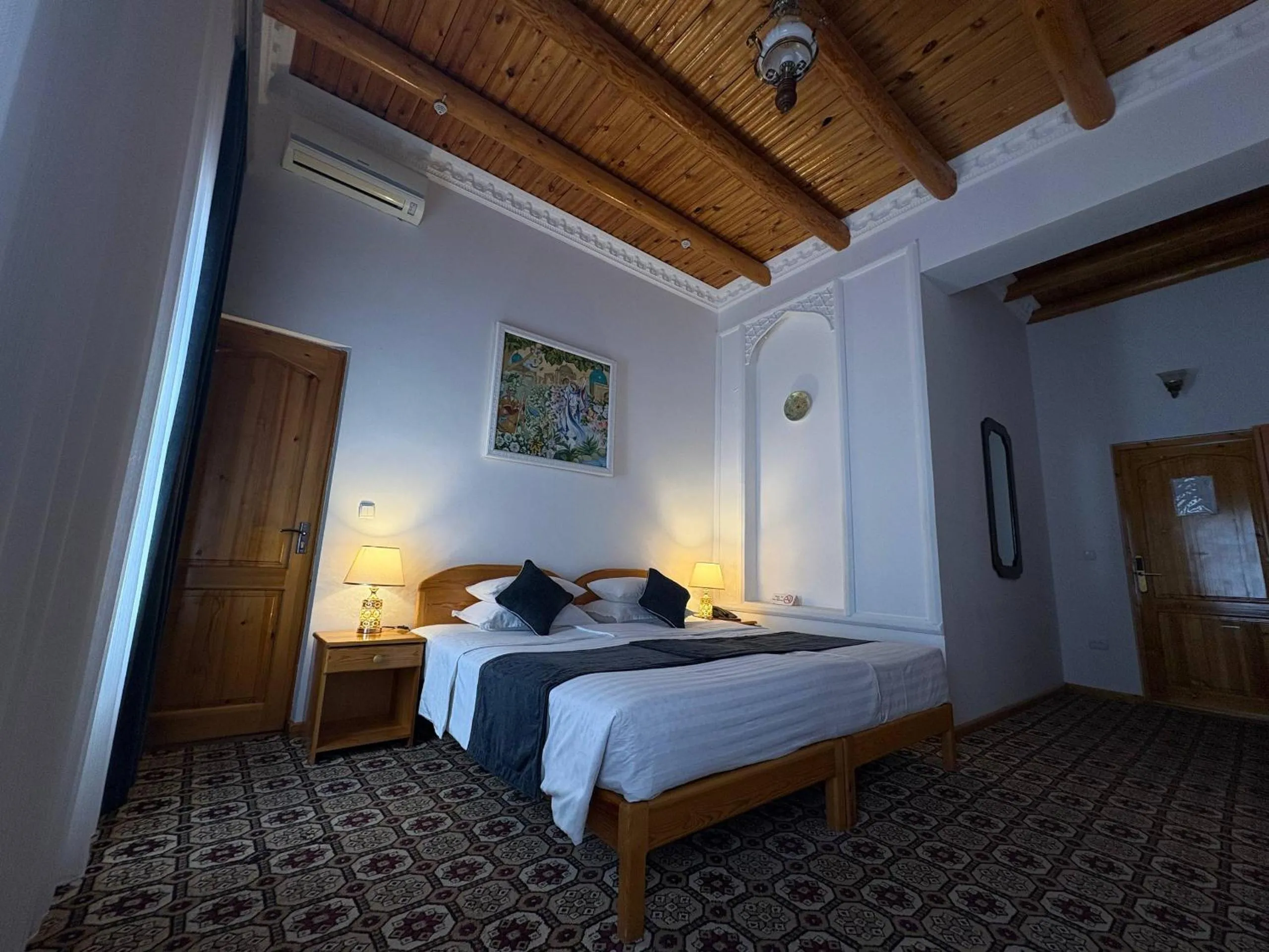 Bed in Porso Boutique Hotel